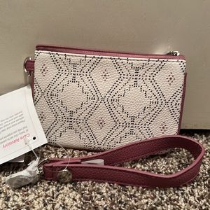 NWT. Rubie Mini with wristlet strap.